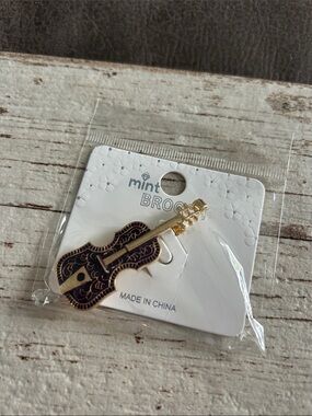 5/$25 Mint Gold and Black Guitar Enamel Brooch